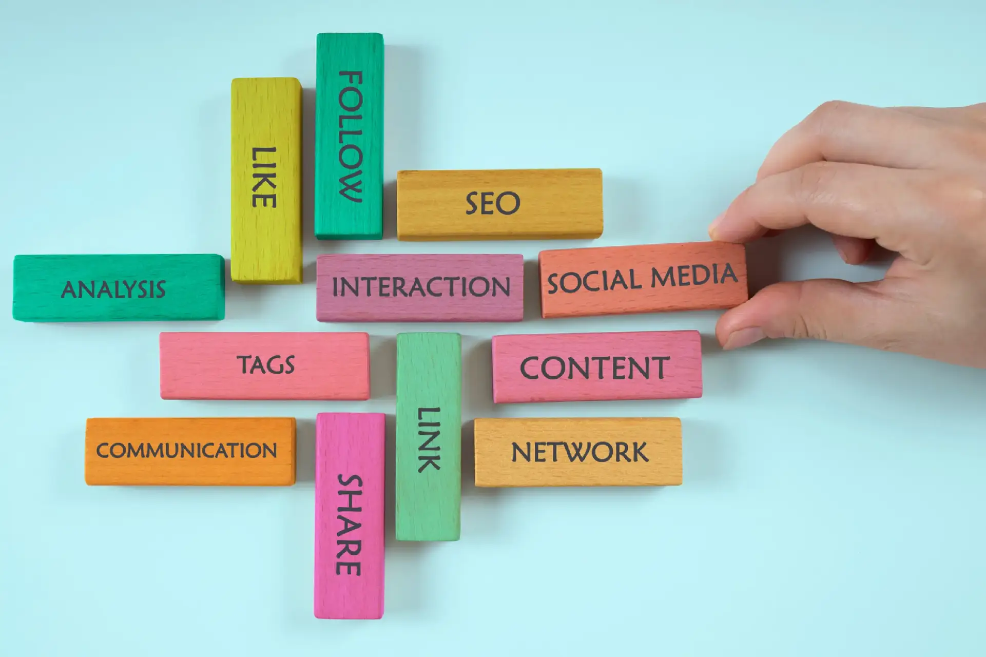 Marketer managing social media accounts, scheduling posts, and tracking engagement Social Media Campaign – Building Brand Engagement and Sales